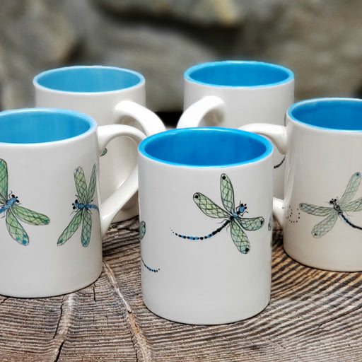 Hand painted mug with Dragonflies swirling around the mug. The inside is glazed in a beautiful bright aqua... 16 oz