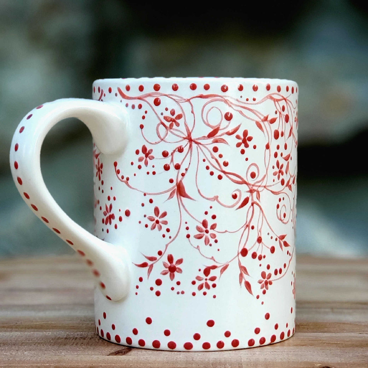Hand painted vintage inspired red and white mug. Trailing tiny vines make this delicate all over design very special. A soft satin glaze gives it such a nice feel for that prefect cuppa. 16 oz kiln fired ceramic mug