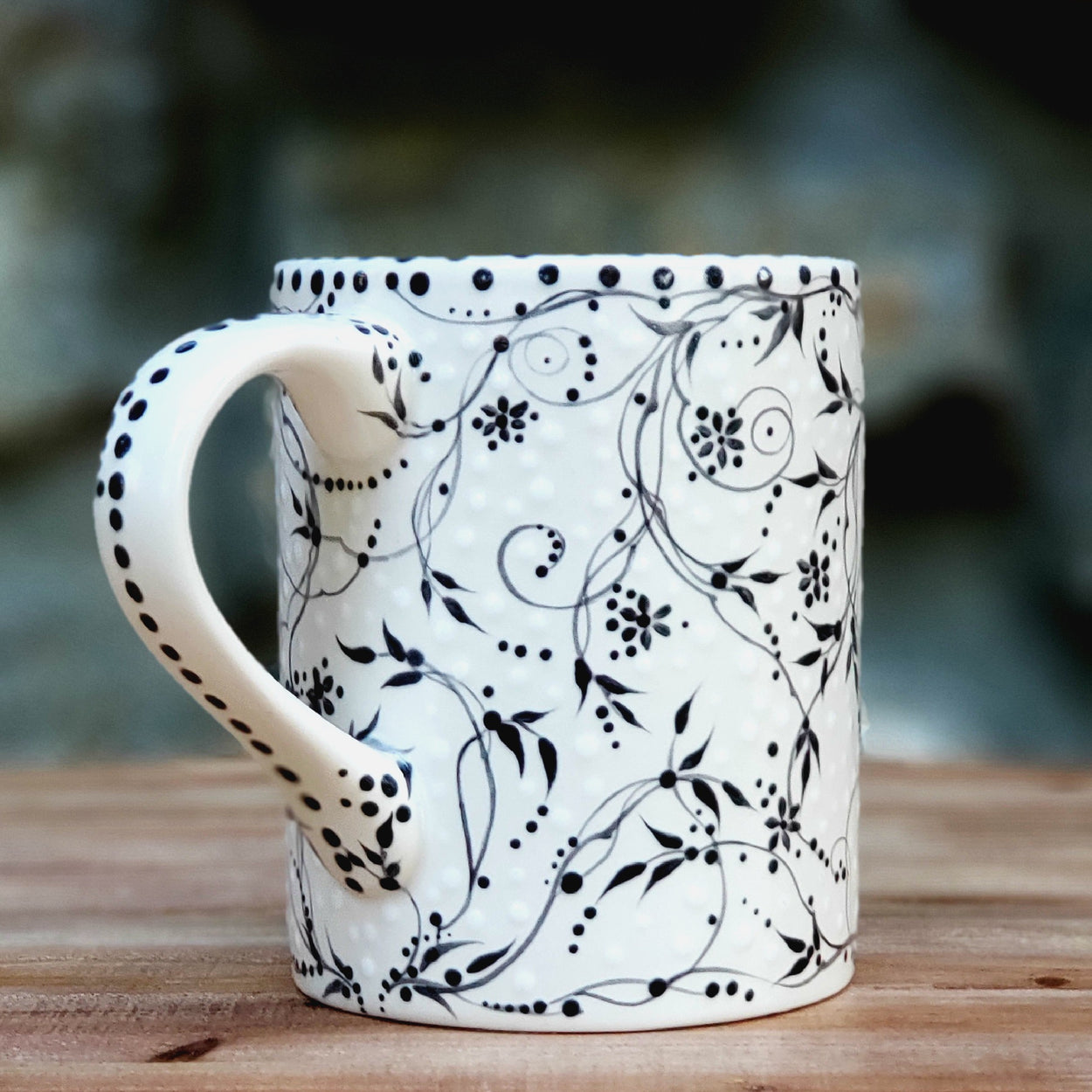 Beautiful hand painted black and white mug with the softest satin glaze and sweet white polka dots... 16 0z. kiln fired ceramic mug