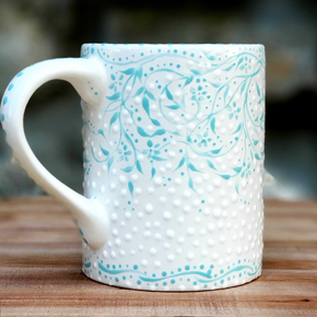 The sweetest hand painted mug! Teeny aqua vines and flowers with white dots make this special mug feel very old fashioned. 16 oz kiln fired ceramic mug