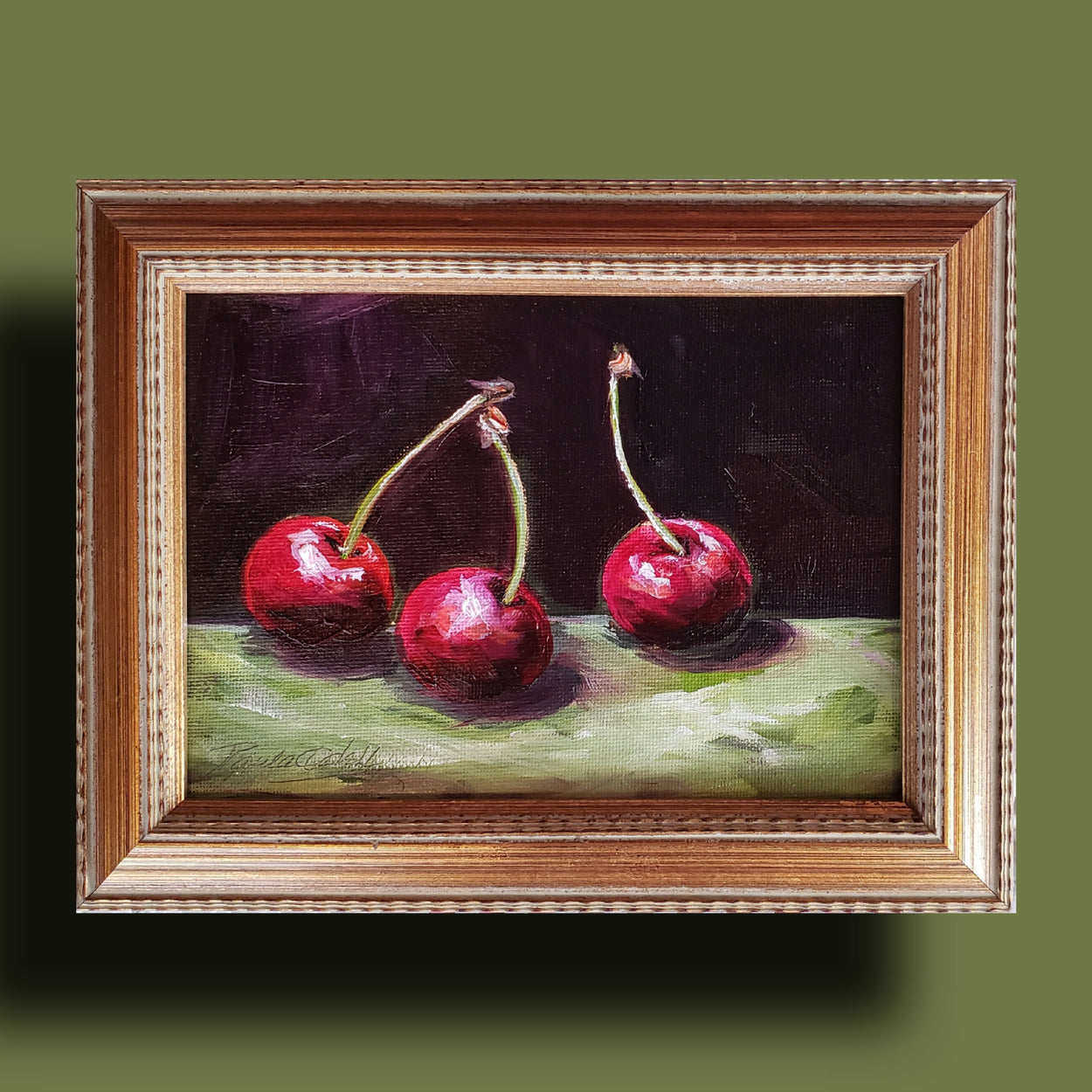 Ripe red cherries painted on a dark green and bright green background. Original oil painting ... 5x7.. comes in a beautiful gold frame