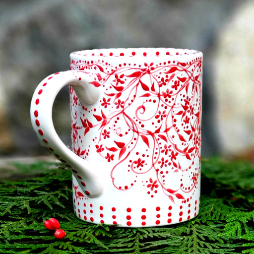 Hand painted red and white mug with darling polka dots and vines. A soft satin glaze that feels so good 